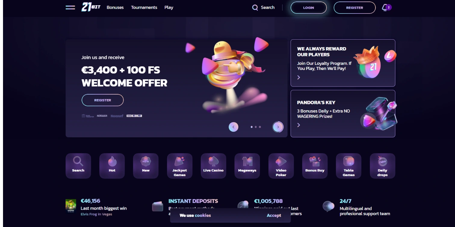 21Bit casino homepage displaying a purple theme, a welcome offer banner, and game category icons.